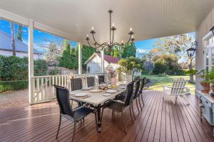 The fenced deck is safe for children and leads onto the driveway.